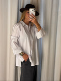 Camicia spacchi laterali